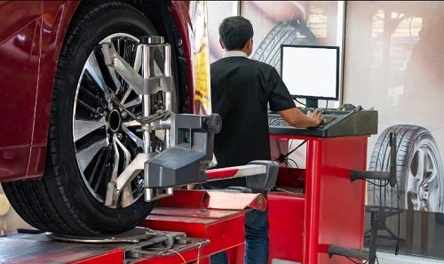 Tire Alignment being conducted by service tech